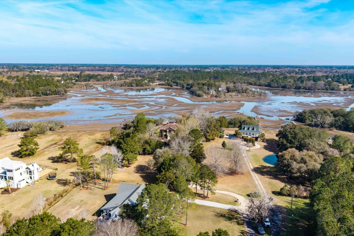 Aerial view of 6411 China Back Lane, Meggett SC showing private dock on Oyster House Creek with tidal marsh and ICW access — Archfield Plantation
