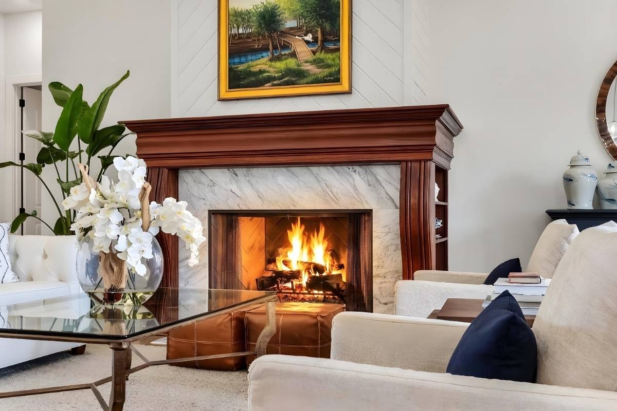Great room wood-burning fireplace at 6411 China Back Lane, Meggett SC