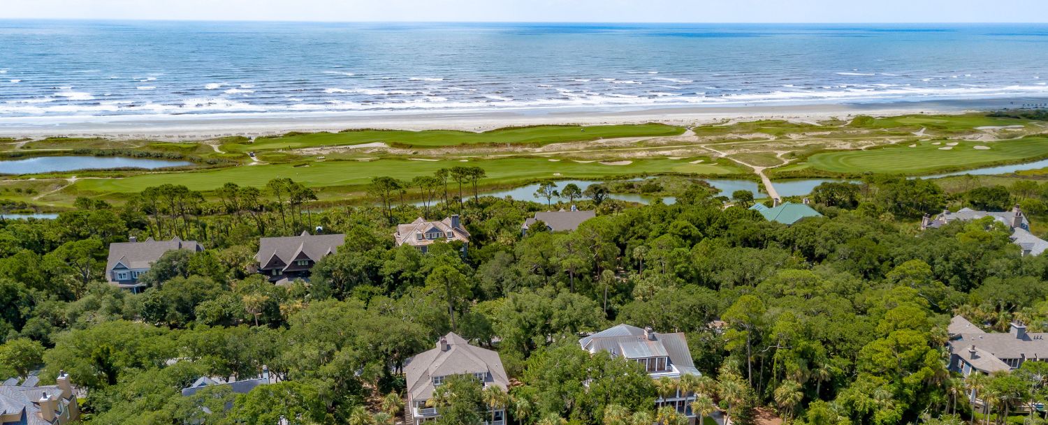 Aerial view of Kiawah Island neighborhoods with the Ocean Course fairways, lagoons, and Atlantic Ocean, South Carolina