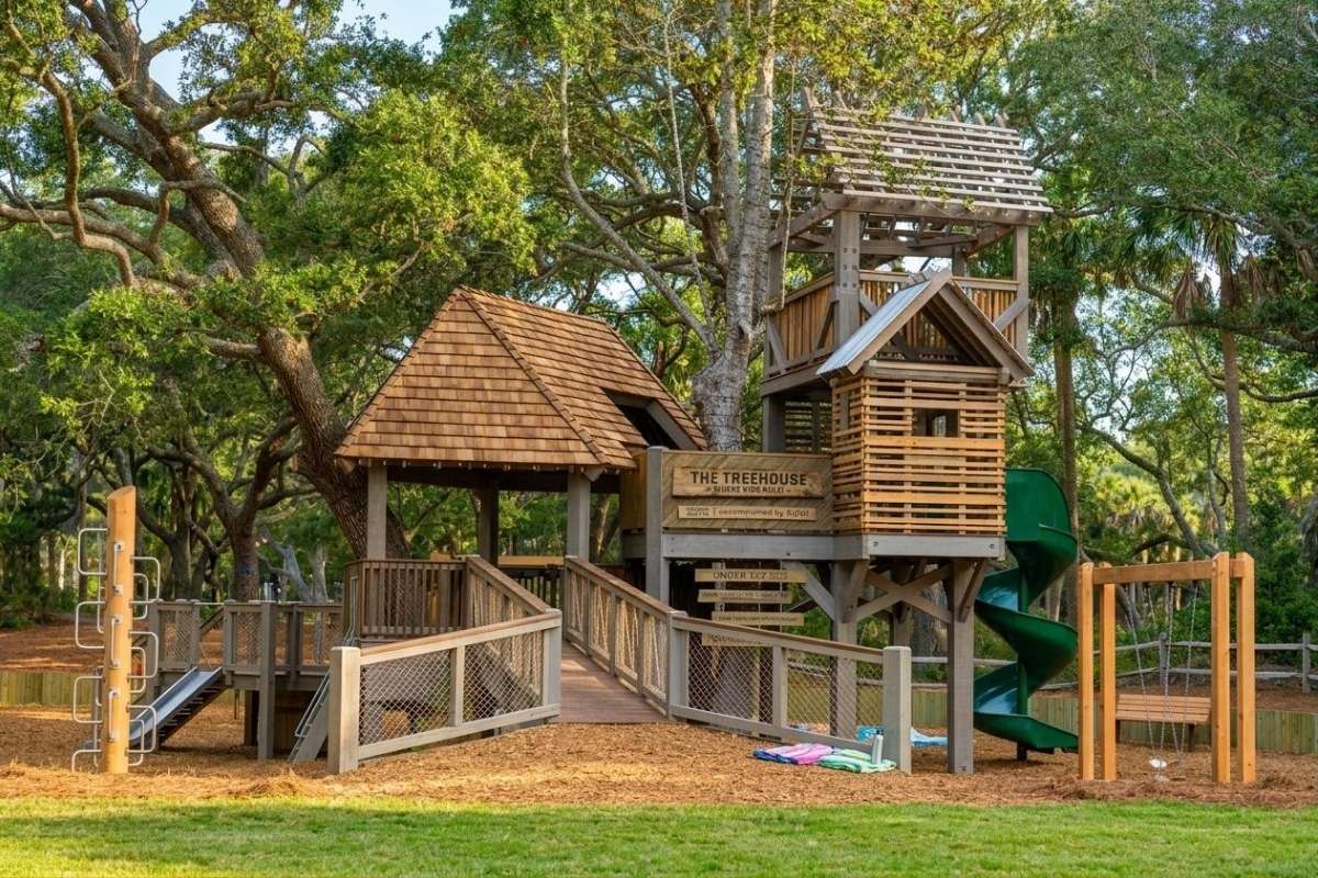 The Treehouse playground structure in the Ocean Park ribbon park beneath live oaks, Kiawah Island