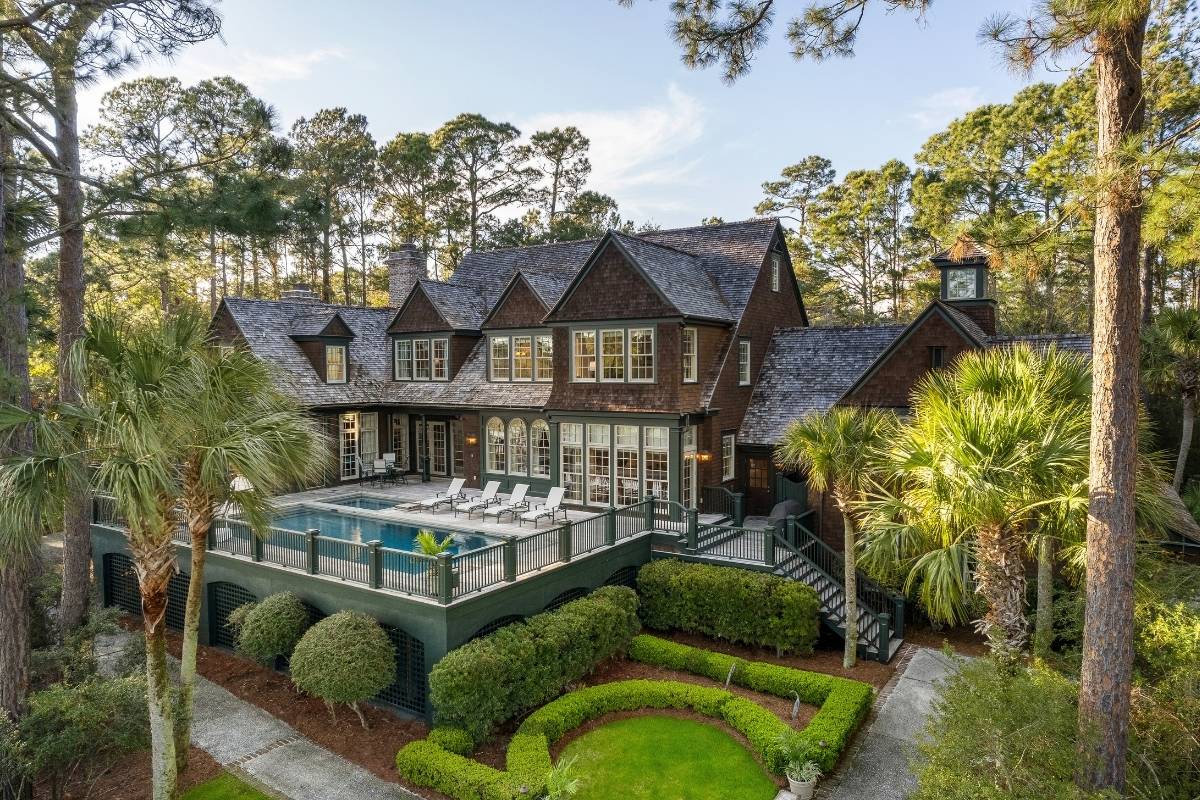 Shingle-style luxury home with private pool, formal gardens, and maritime forest setting in The Preserve, Kiawah Island SC